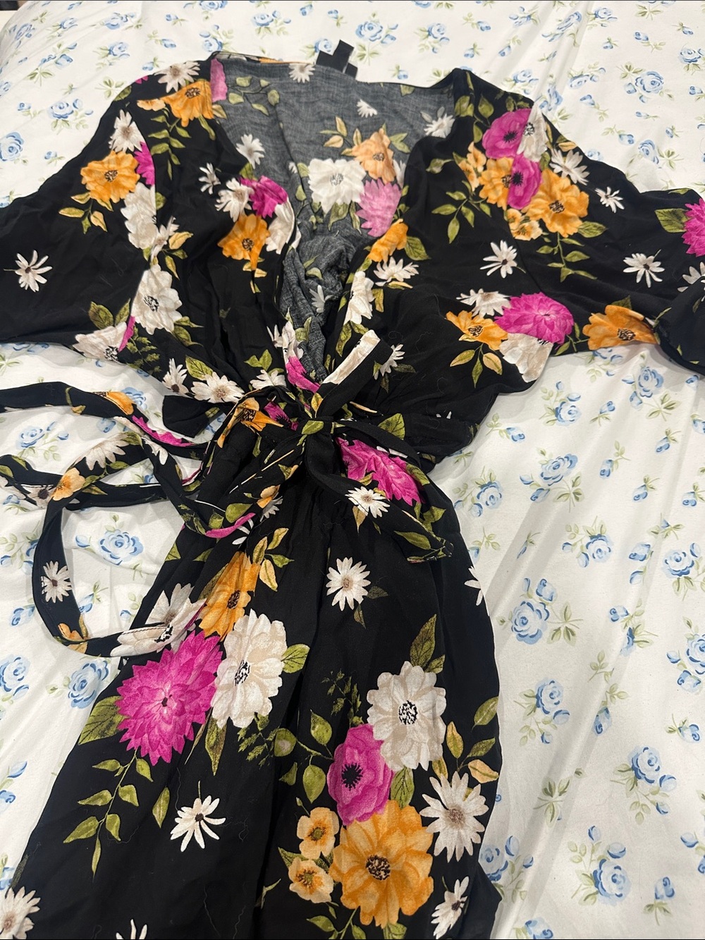 Black Floral Wrap shirt with Pink, Yellow & White Blooms